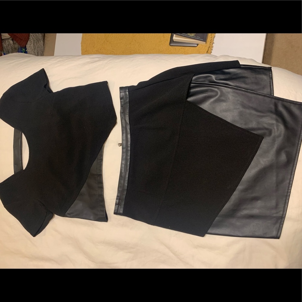 Faux leather crop top and skirt set.